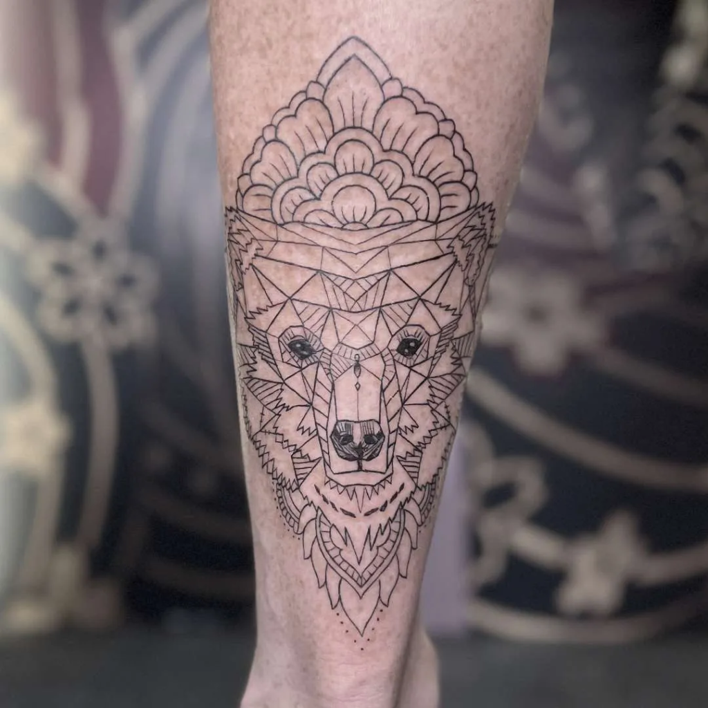 A well-done fine line wolf tattoo from a Canggu tattoo studio.